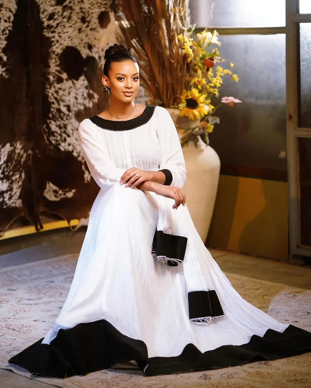 Contemporary Opulence: Black Menen Elegance in Modern Habesha Dress