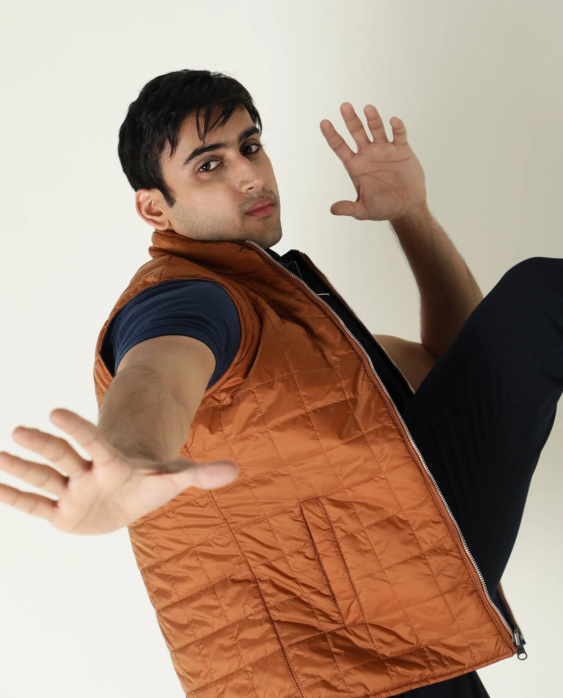 Rare Rabbit Men's Fillex Orange Solid Reversible Quilted Sleeveless Puffer Jacket
