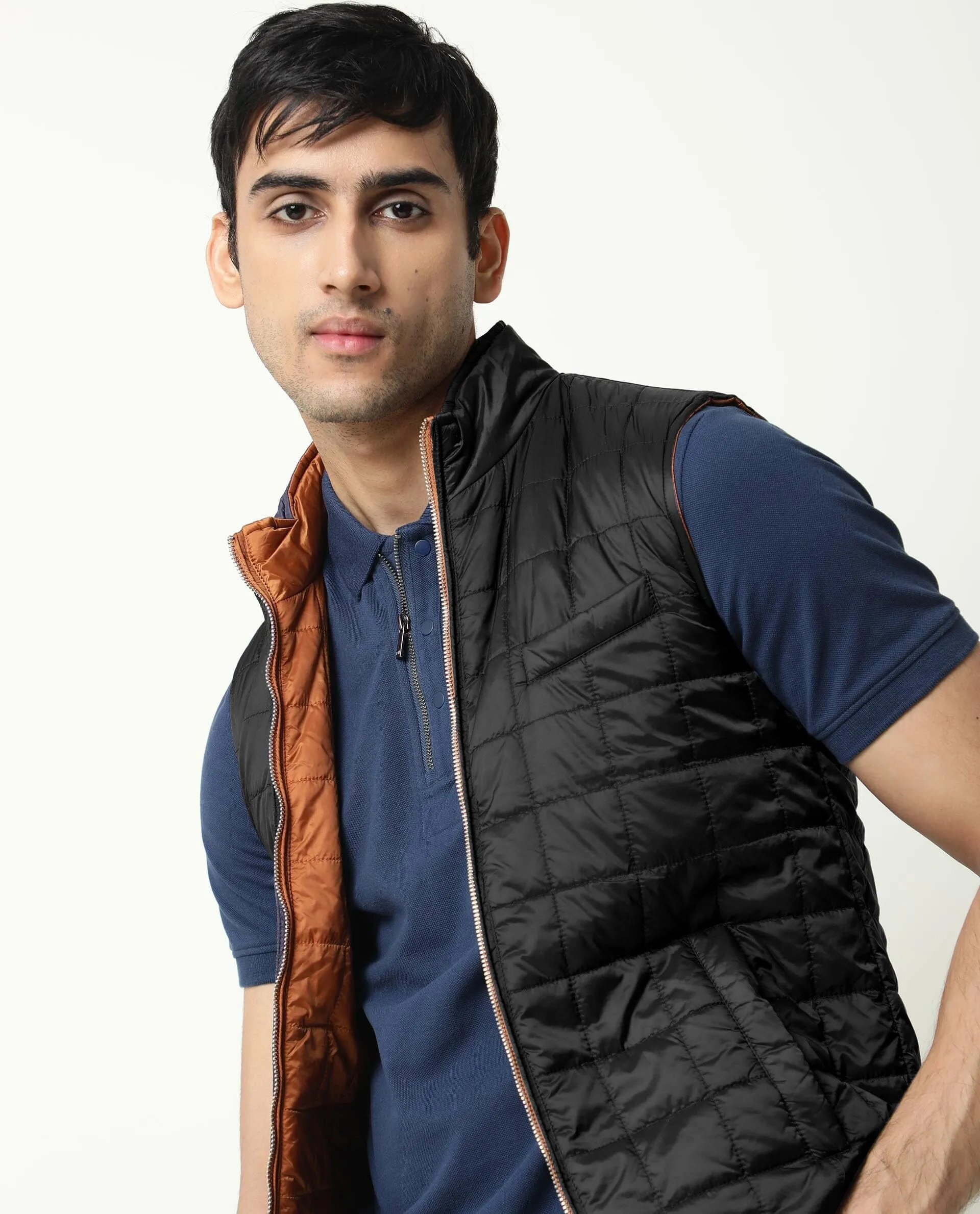 Rare Rabbit Men's Fillex Orange Solid Reversible Quilted Sleeveless Puffer Jacket