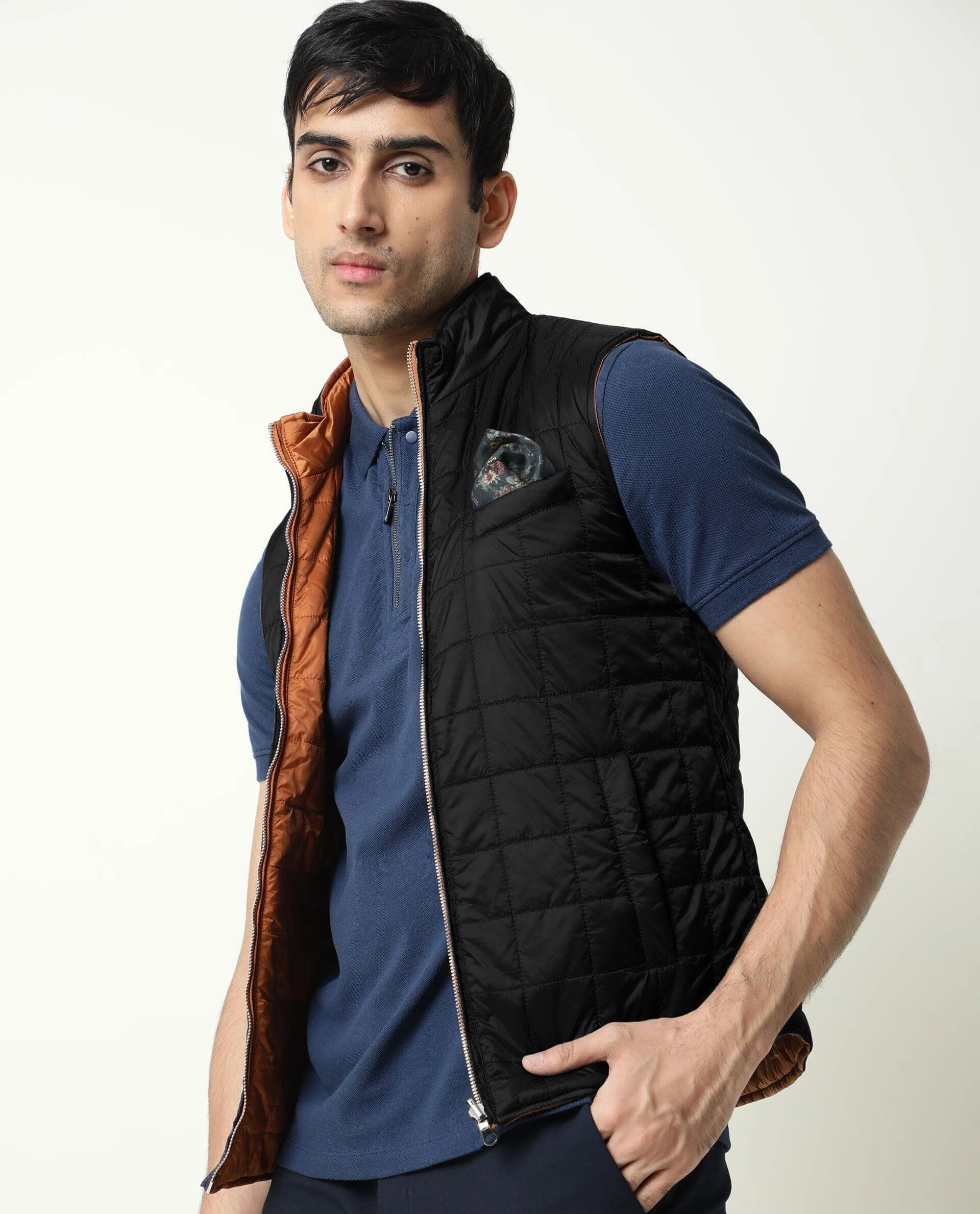 Rare Rabbit Men's Fillex Orange Solid Reversible Quilted Sleeveless Puffer Jacket